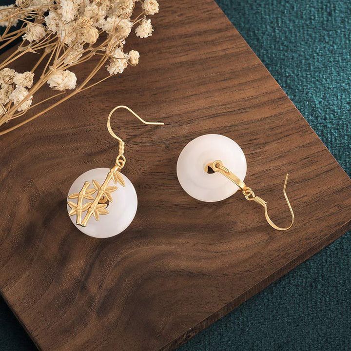 Pendientes de la fortuna de jade blanco FengShui de Buddha Stones