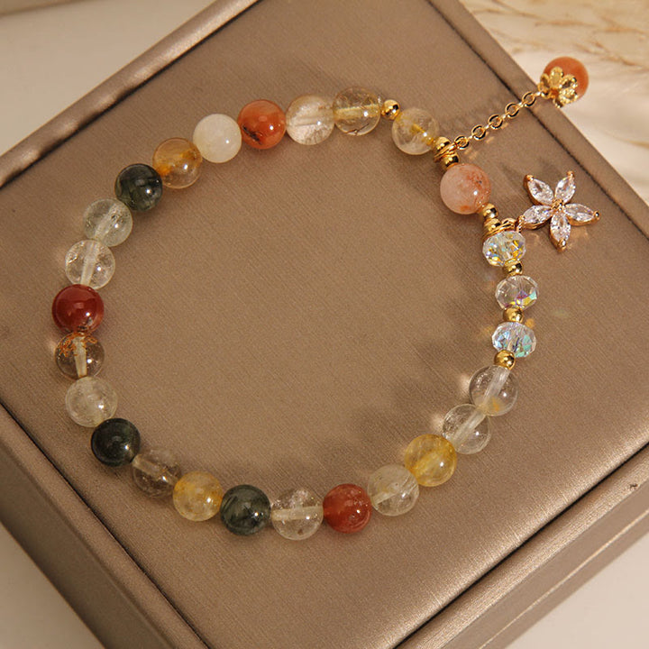 Pulsera de flores de circonio auspicioso de cuarzo rutilado multicolor con Buddha Stones