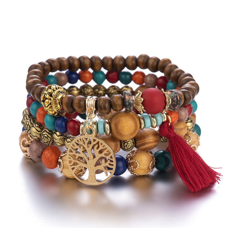 Pulsera curativa con borlas de árbol en capas de madera de wengué
