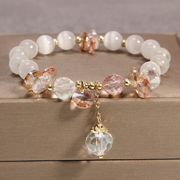 Pulsera con dije de paz y cristal rosa con ojo de gato y Buddha Stones - Ojo de gato - image 0
