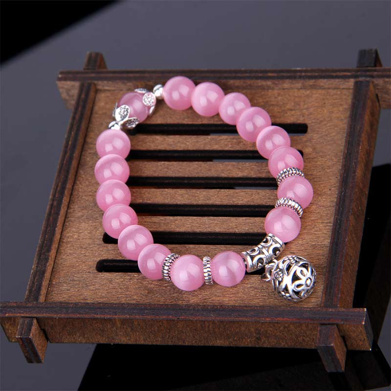 Pulsera de la suerte con ojo de gato tibetano y Buddha Stones