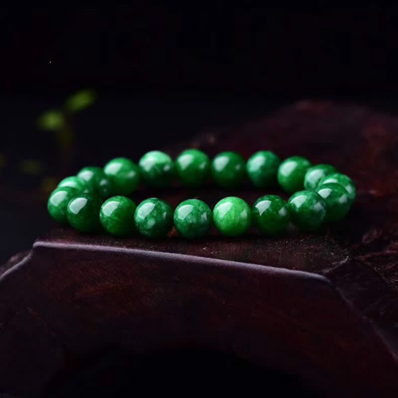 Pulsera de armonía tranquila con cuentas de jade cian y piedras de Buddha Stones