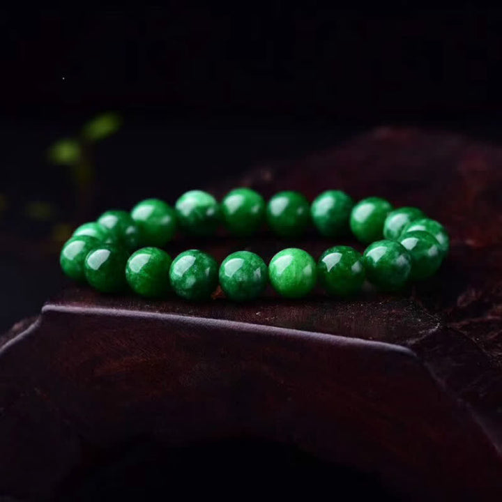 Pulsera de armonía tranquila con cuentas de jade cian y piedras de Buddha Stones