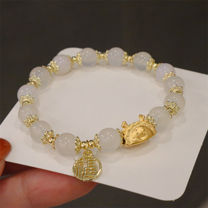 Buddha Stones Año del Dragón Ágata roja Cuarzo fresa Obsidiana negra Jade Granate Perla Cinabrio Bola de masa Dragón Suerte Fu Pulsera con personajes