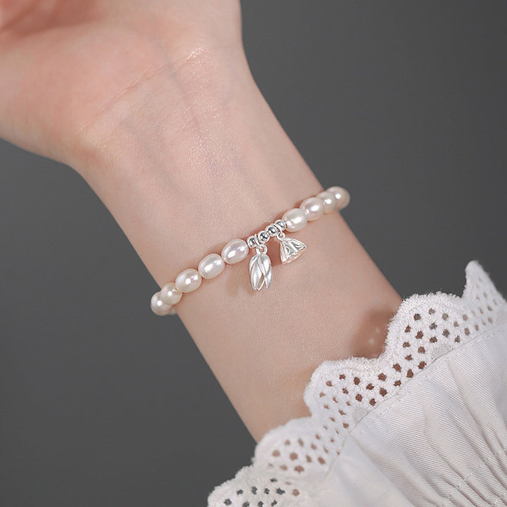 Pulsera curativa de perlas naturales con vaina de flor de loto de plata de ley 999 con Buddha Stones