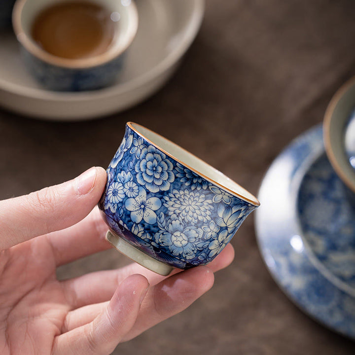 Tazas de té de cerámica de crisantemo con flor de ciruelo y peonía de loto Vintage con Buddha Stones