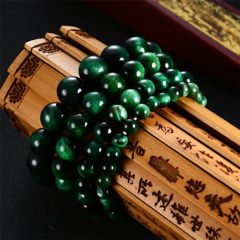 Pulsera de fuerza de ojo de tigre verde natural con Buddha Stones