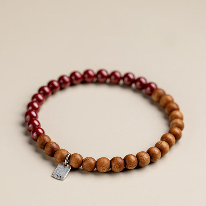 Pulsera de cinabrio de madera de melocotón de plata de ley 925 con Buddha Stones para protegerse de los malos espíritus