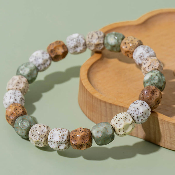Pulsera de riqueza auspiciosa de semillas Bodhi coloridas naturales de Buddha Stones
