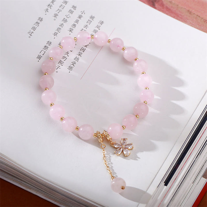 Pulsera de amor de flor de ciruelo de cristal rosa natural - Cristal rosa (Calidez relajante) - image 0