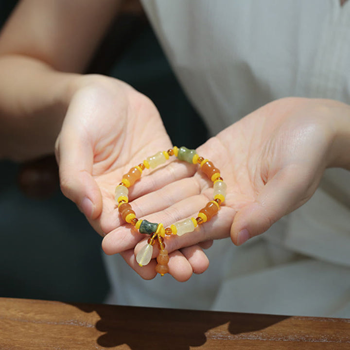 Pulsera con dijes de riqueza de calabaza de jade de seda dorada natural