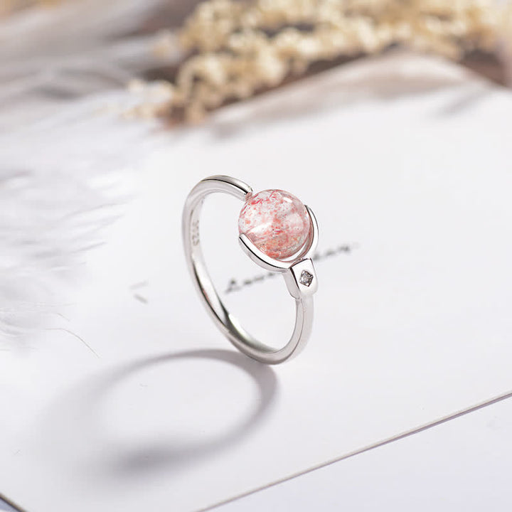 Anillo de rotación calmante de cristal rosa con Buddha Stones