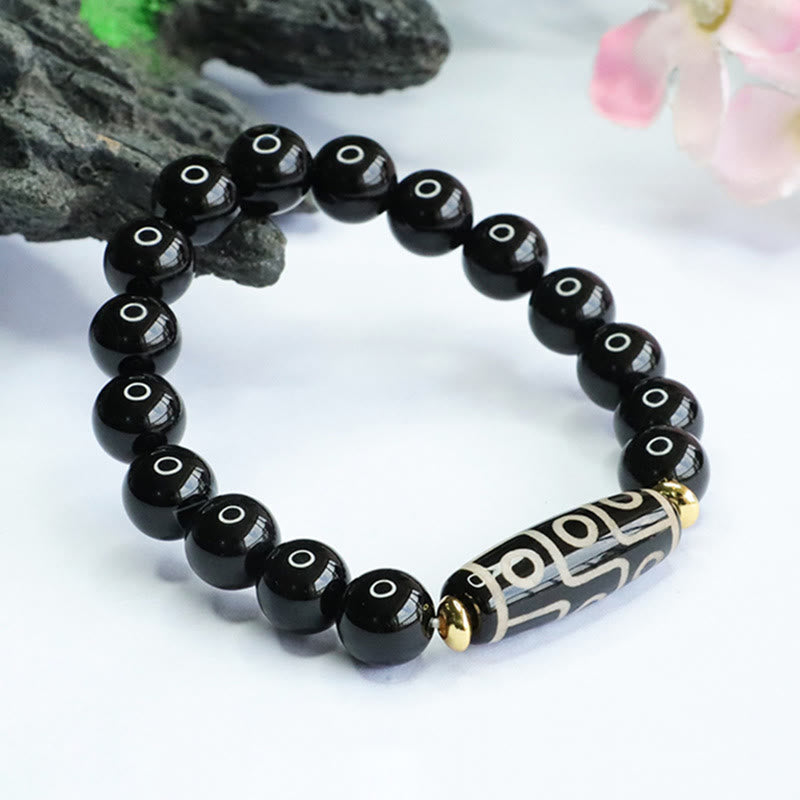 Pulsera de poder de ónix negro con cuentas Dzi tibetanas de nueve ojos de Buddha Stones