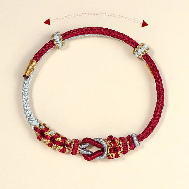 Pulsera de protección de la suerte con nudo de paz de ocho hilos con nudo de flor de melocotón hecho a mano con Buddha Stones