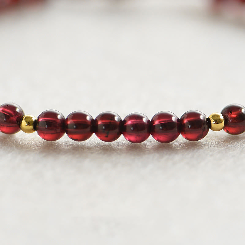 Pulsera de estabilidad con cuentas doradas y granate natural con Buddha Stones - image 3