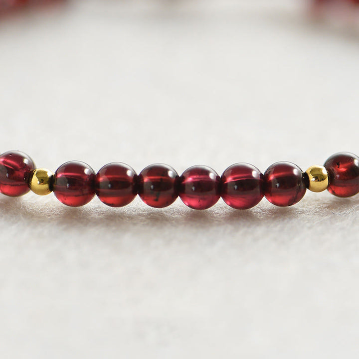 Pulsera de estabilidad con cuentas doradas y granate natural con Buddha Stones - image 3