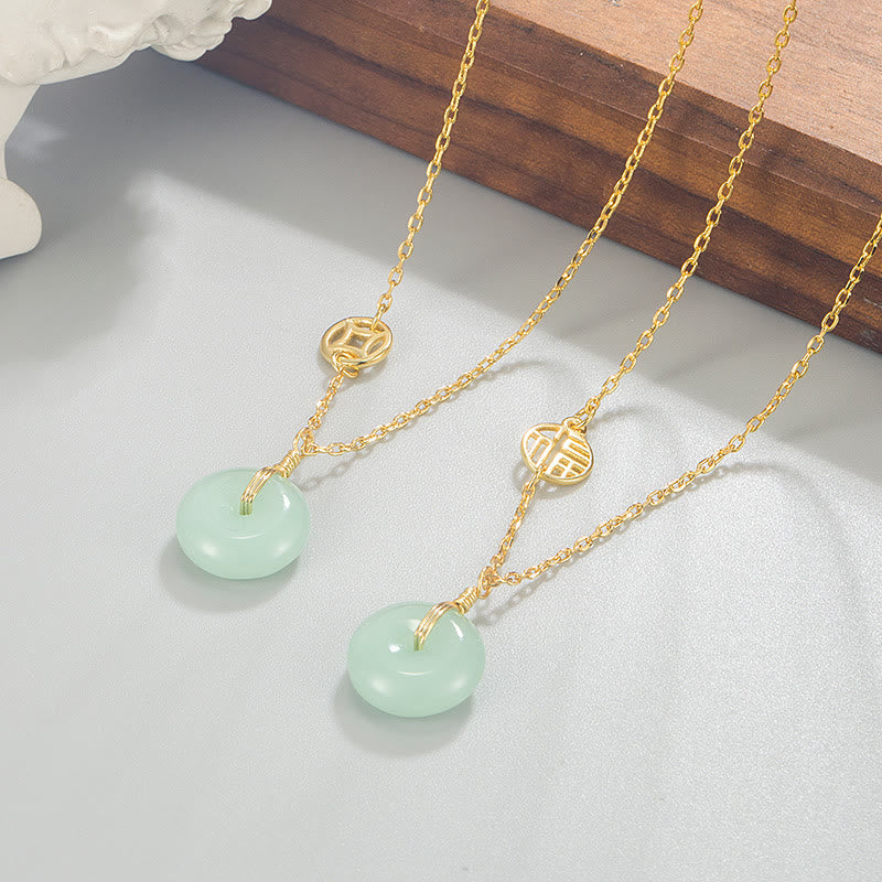 Collar con colgante de abundancia con hebilla de paz y moneda de cobre con carácter de Jade Fu de Buddha Stones