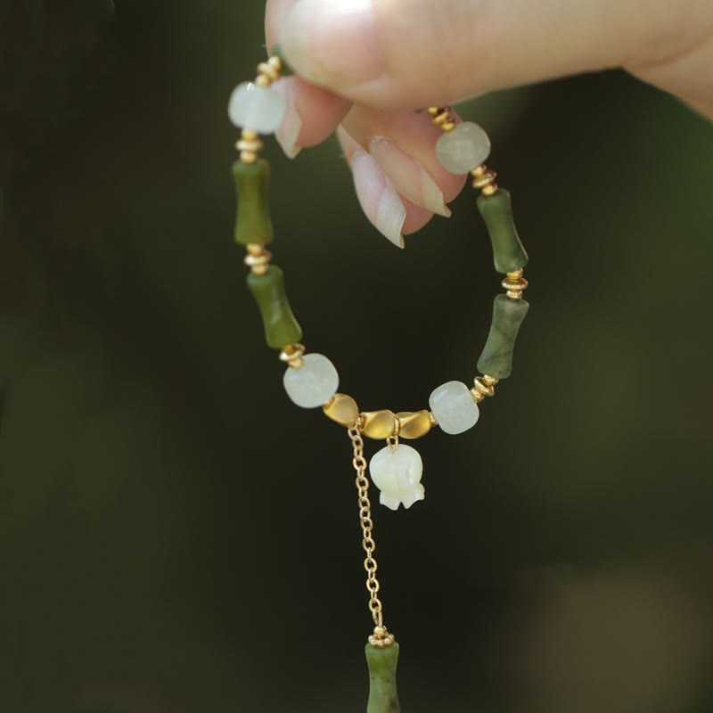 Pulsera de riqueza con Buddha Stones, bambú verde, jade, lirio de los valles