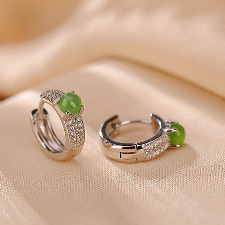 Pendientes de botón de éxito de jade cian redondos de plata de ley 925 con Buddha Stones