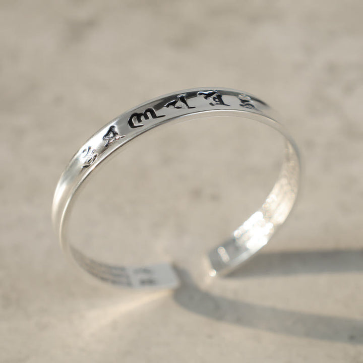 Pulsera de cobre blanco con mantra tibetano de Buddha Stones
