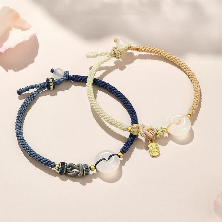 Pulsera de cuerda tejida hecha a mano de ágata blanca con hebilla de paz y suerte y protección