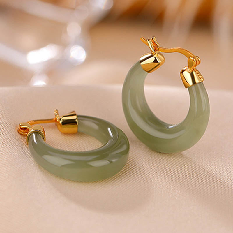 Pendientes colgantes de suerte de prosperidad de jade cian redondo de Buddha Stones