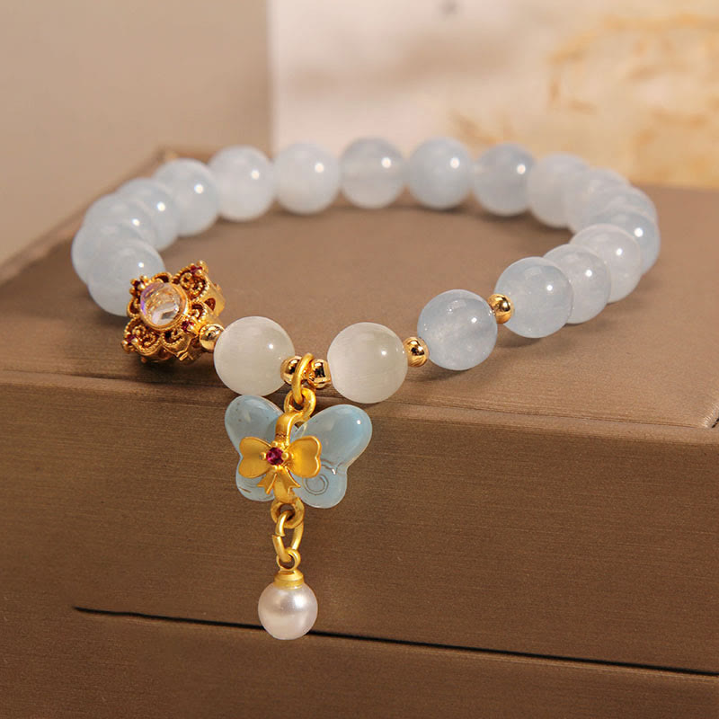 Pulsera con dije de perlas y mariposas curativas con ojo de gato, aguamarina y Buddha Stones