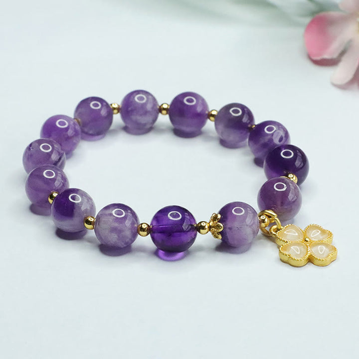 Pulsera con dije de trébol de cuatro hojas y paz interior de cristal de amatista natural con piedras de Buddha Stones