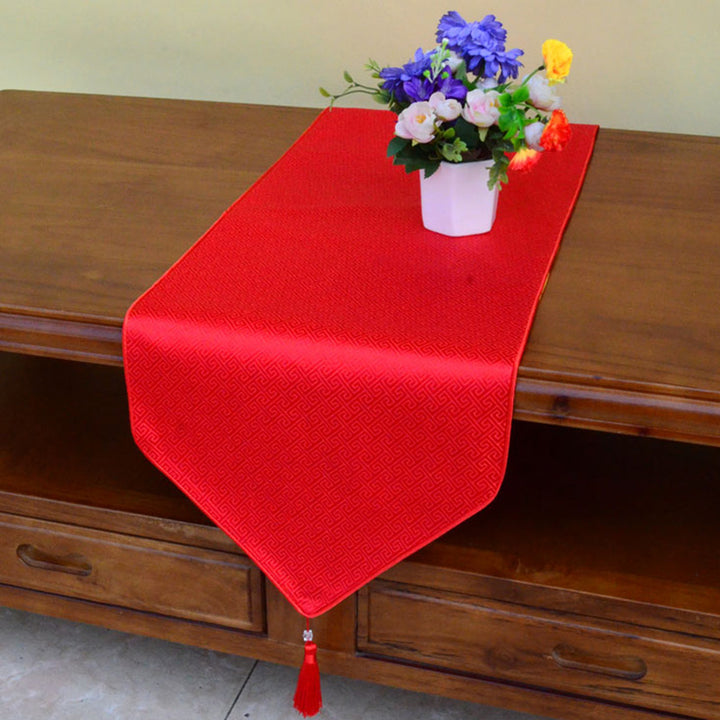 Camino de mesa Jacquard con borlas y símbolos propicios tibetanos con diseño de dragón Vajra y flores de altar de oración