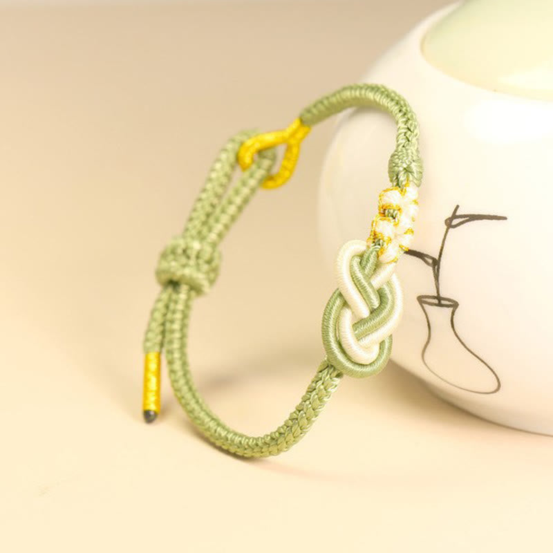 Pulsera de conexión de suerte con nudo de flor de melocotón, nudo de paz de ocho hilos hecho a mano con Buddha Stones