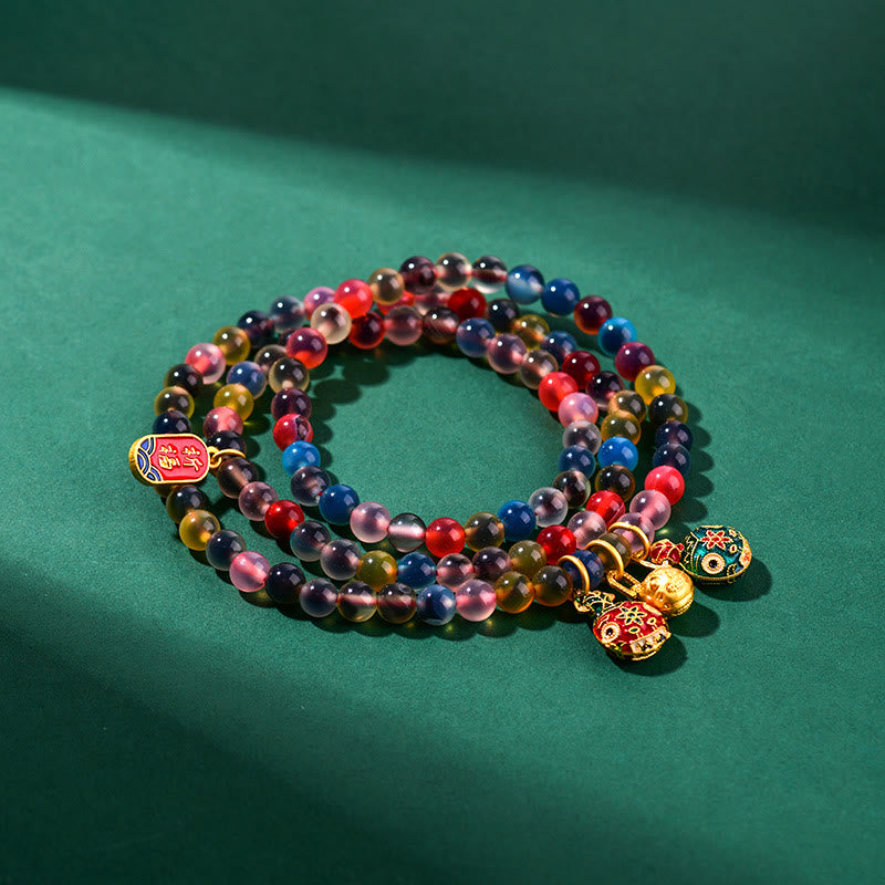 Pulsera de triple envoltura con dije de fuerza familiar de bestia tragadora de oro con ágata de caramelo colorida y Buddha Stones
