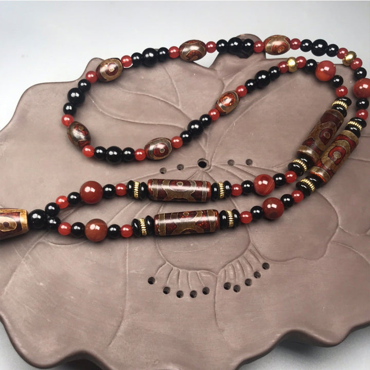 Collar de salud y riqueza con Buddha Stones Dzi de nueve ojos, ágata roja