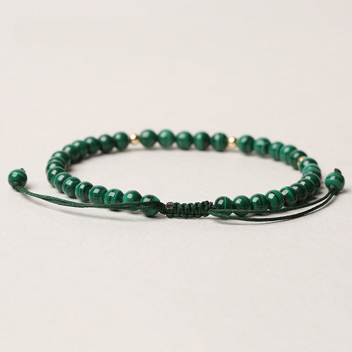 Pulsera de hilo de calma y protección de malaquita natural con Buddha Stones