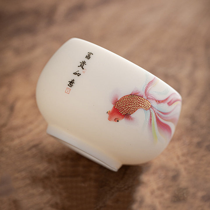 Taza de té de cerámica de porcelana blanca, pez Koi, Buddha Stones, taza de té de Kung Fu