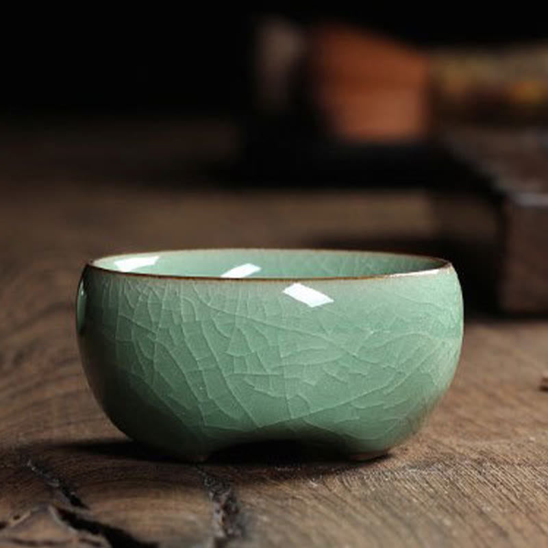 Taza de té de cerámica con forma de pez koi de colores y Buddha Stones