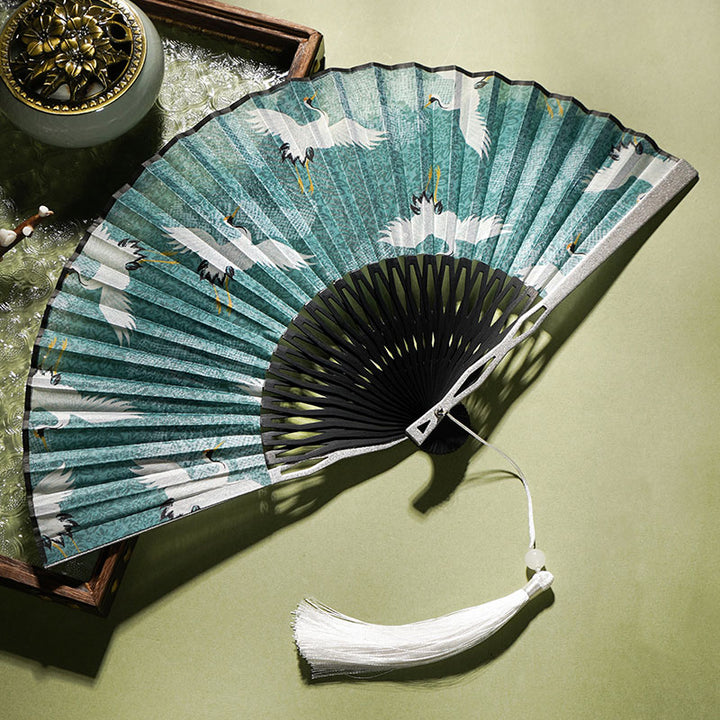 Abanico plegable de bambú de seda de mano con diseño de grulla blanca y azul vintage de Buddha Stones