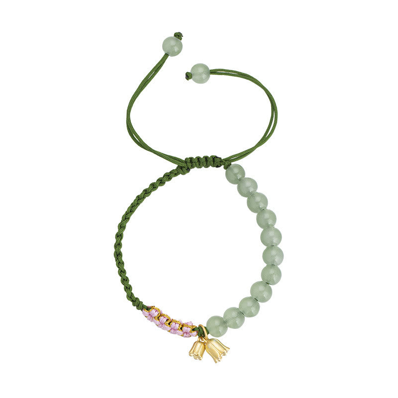 Pulsera trenzada de la suerte con dije de lirio de los valles y cuentas de jade hechas a mano con Buddha Stones