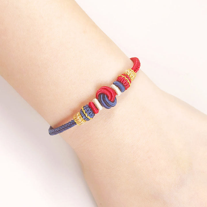 Pulsera de conexión de suerte con nudo de paz de ocho hilos hecha a mano con cuerda de dos colores con Buddha Stones