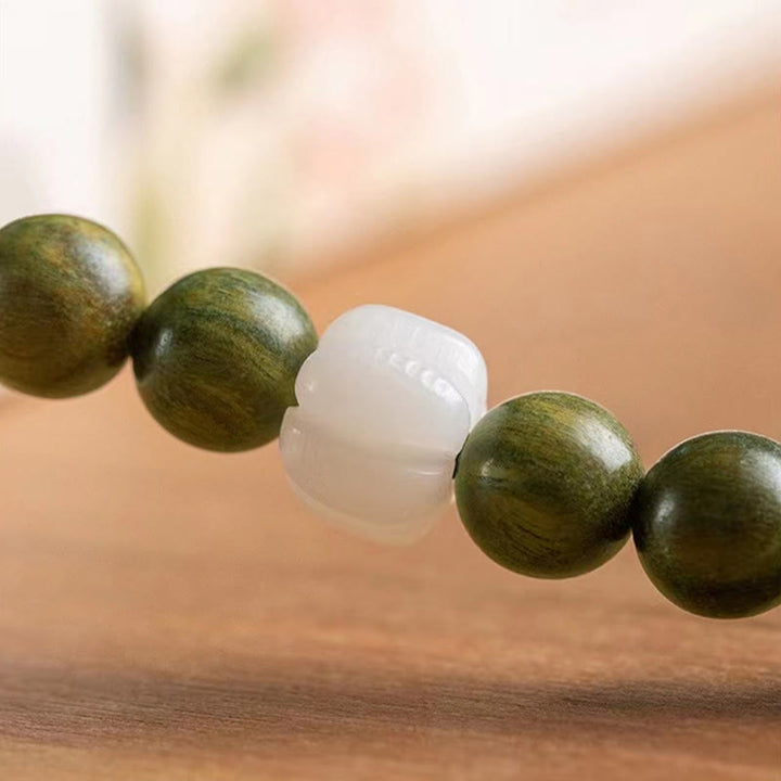 Pulsera calmante de semillas de Bodhi de sándalo verde natural con Buddha Stones