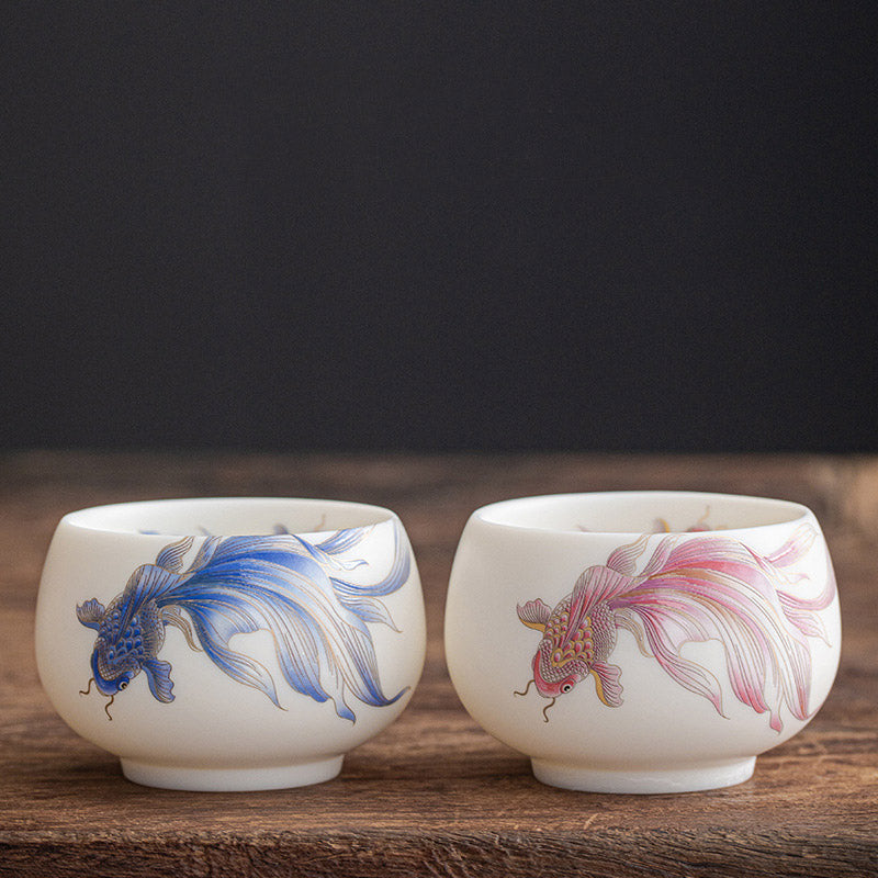 Taza de té de cerámica de porcelana blanca, pez Koi, Buddha Stones, taza de té de Kung Fu