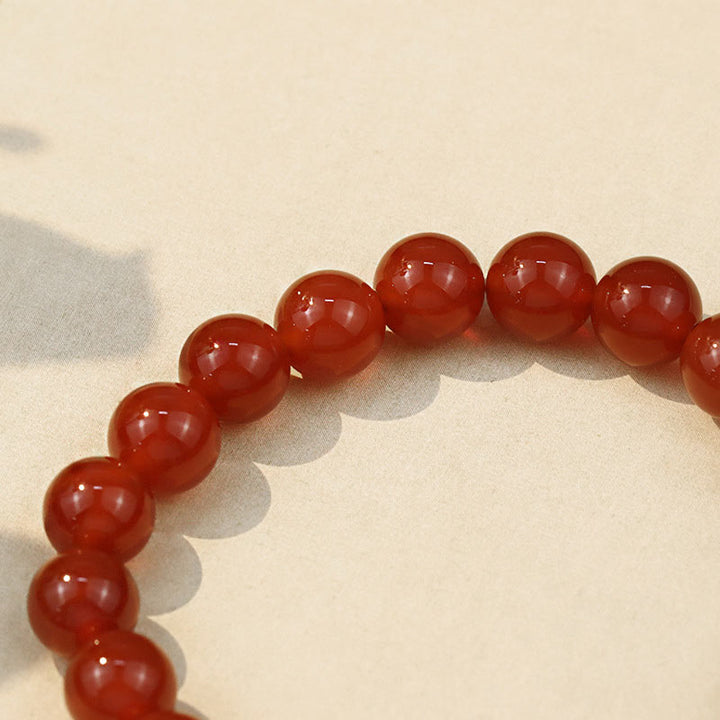 Pulsera de éxito de Buddha Stones con ágata roja natural de piedras de Buda