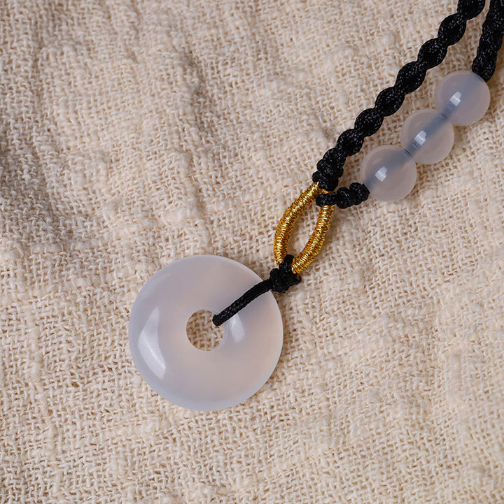 Colgante de collar curativo con hebilla de paz, calcedonia, cuarzo fresa, Buddha Stones