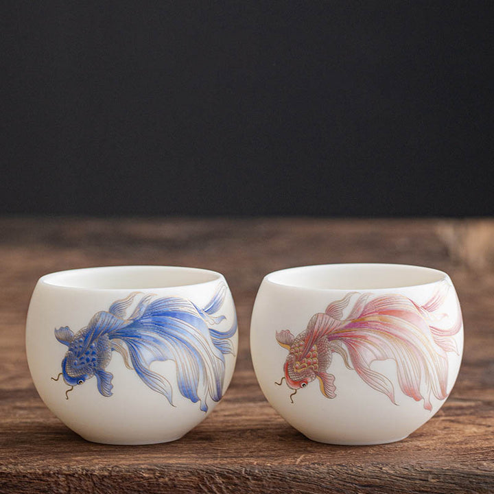 Taza de té de cerámica de porcelana blanca, pez Koi, Buddha Stones, taza de té de Kung Fu