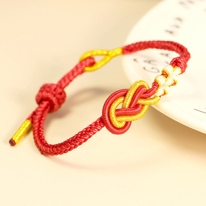Pulsera de conexión de suerte con nudo de flor de melocotón, nudo de paz de ocho hilos hecho a mano con Buddha Stones