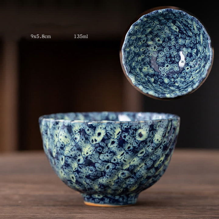 Tazas de té de cerámica con diseño de flor de melocotón y Buddha Stones