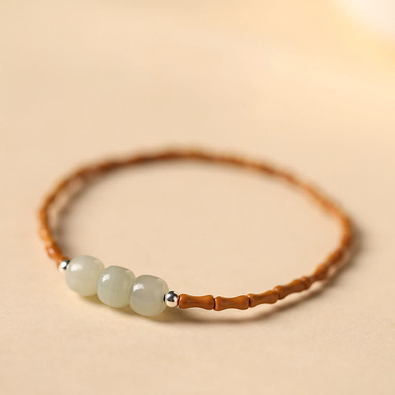 Pulsera de la suerte con cuentas de jade hetiano con patrón de bambú de oliva natural con Buddha Stones