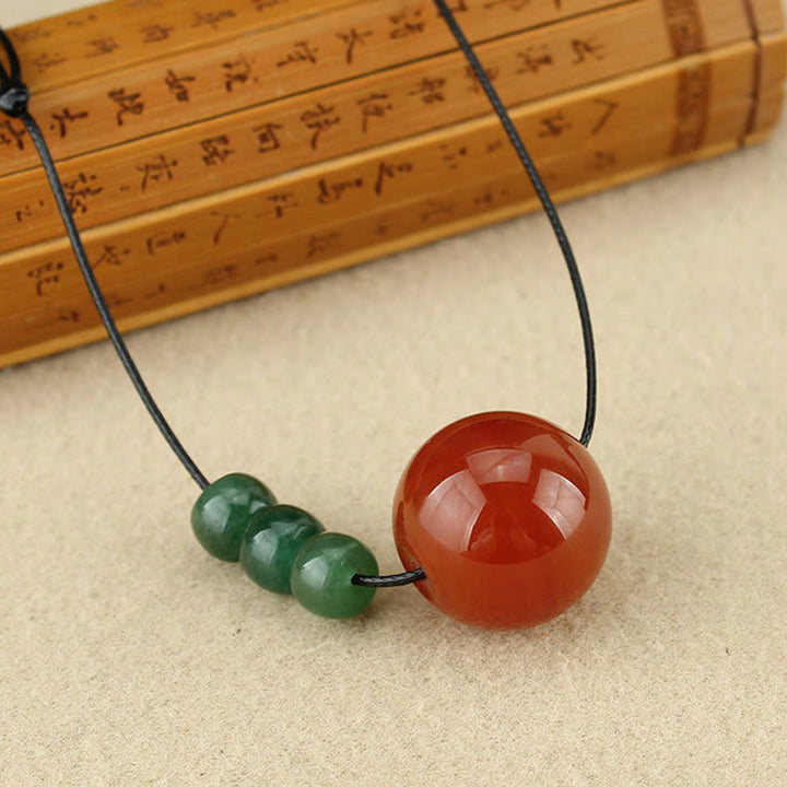 Buddha Stones, ágata roja, Aventurina verde, cuentas de semilla de Bodhi, collar de cuerda de cuero tranquilo, colgante