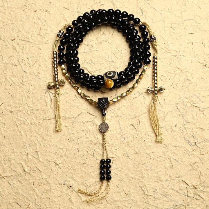 Pulsera de protección de cuentas Dzi de tres ojos de ónix negro con cuentas tibetanas de 108 Mala