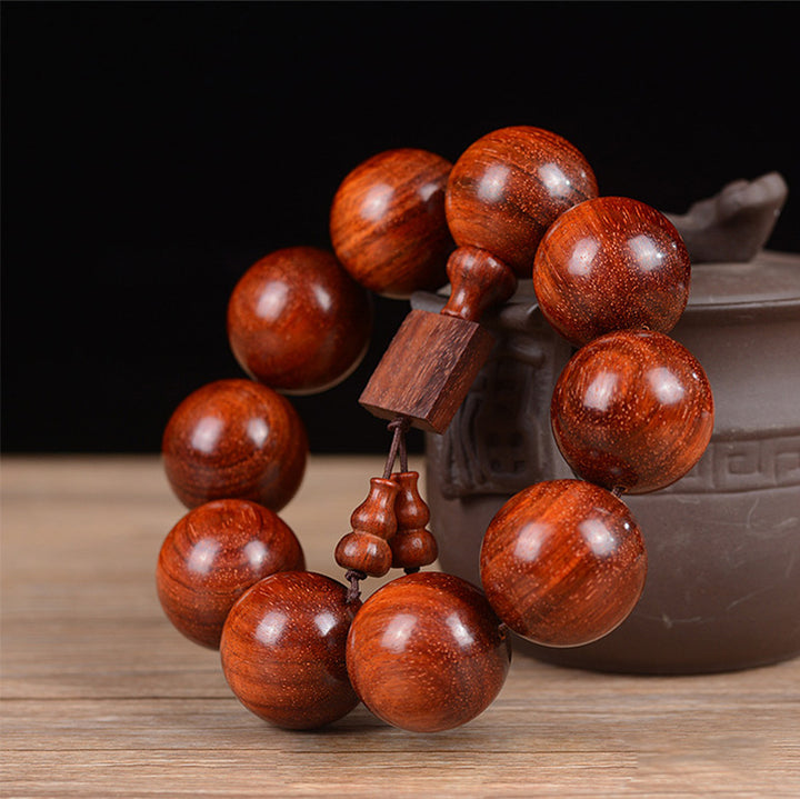 Pulsera de relajación de sándalo rojo de hoja pequeña tibetana con Buddha Stones