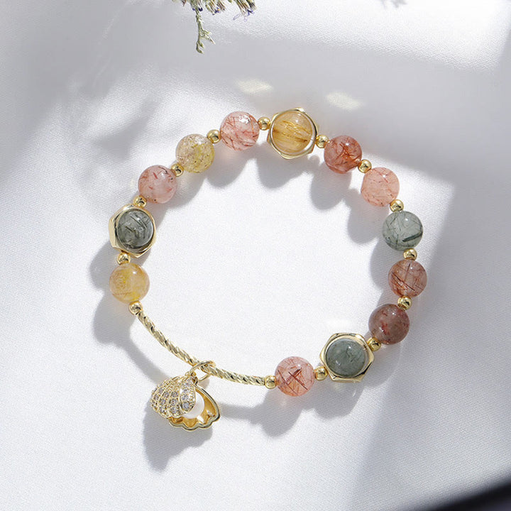Pulsera de cuentas de protección de concha de cuarzo rutilado de colores naturales con Buddha Stones